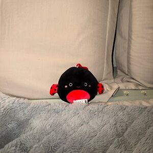 Bold Black and Red Bag with Plush Texture